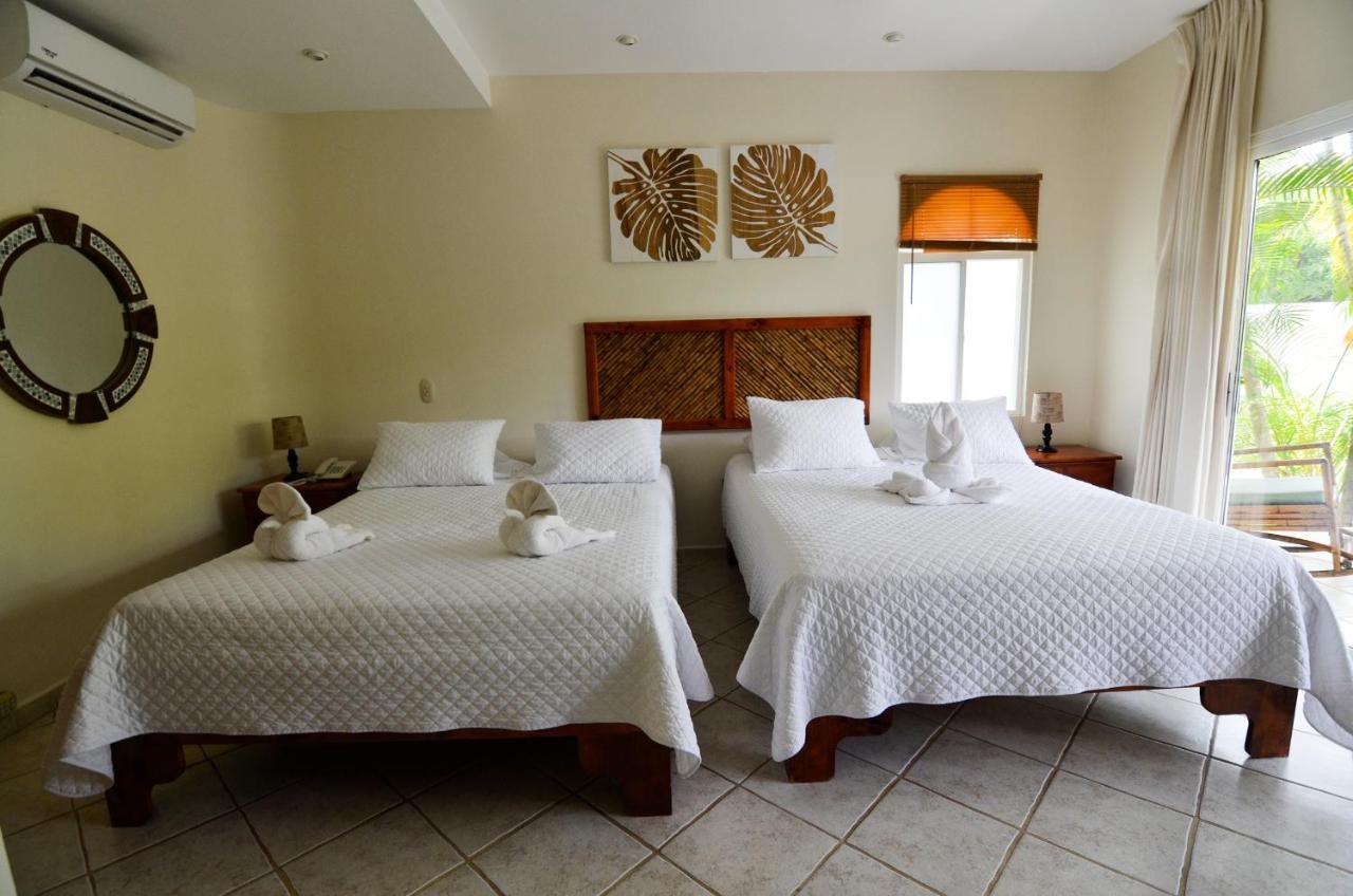 Cocomar Beachfront Hotel Parrita Bagian luar foto